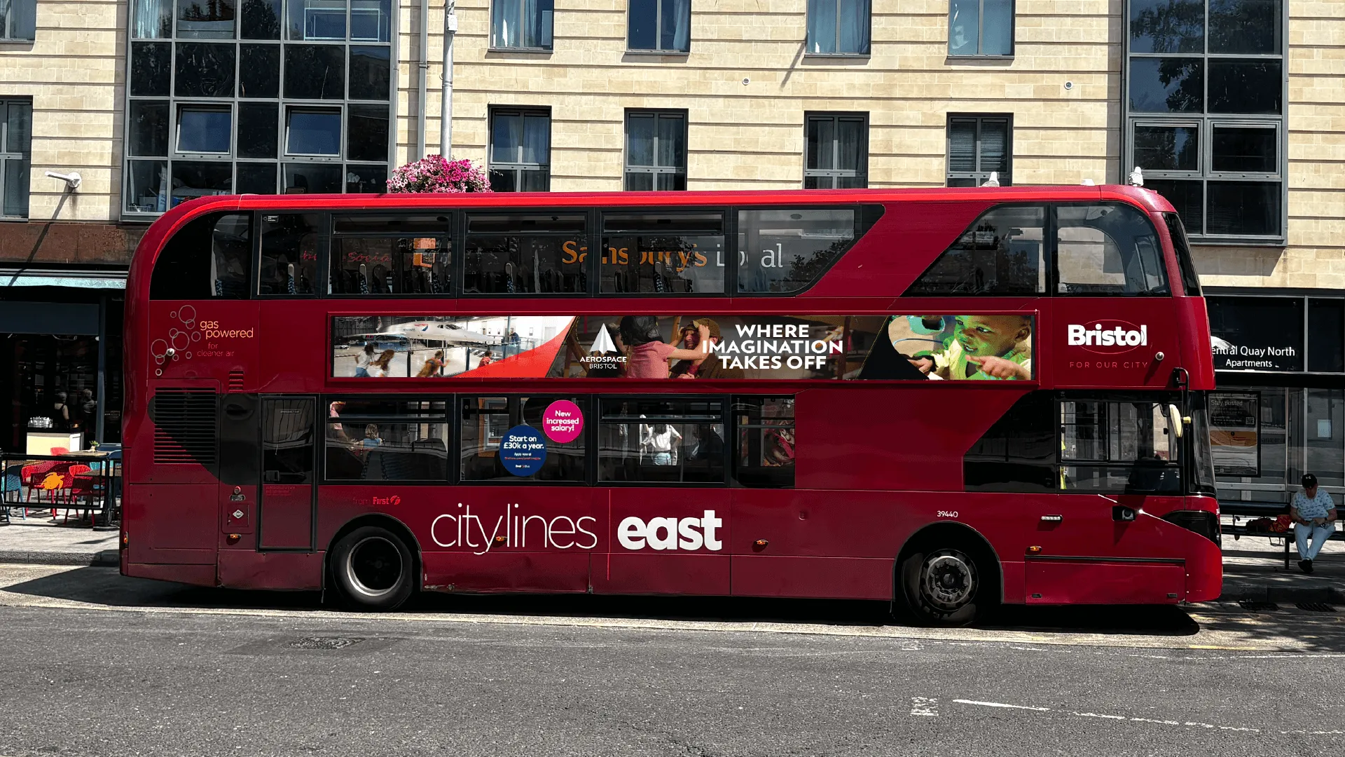 Bus with our banner for Aerospace Bristol, with a caption saying "Where Imagination takes off"